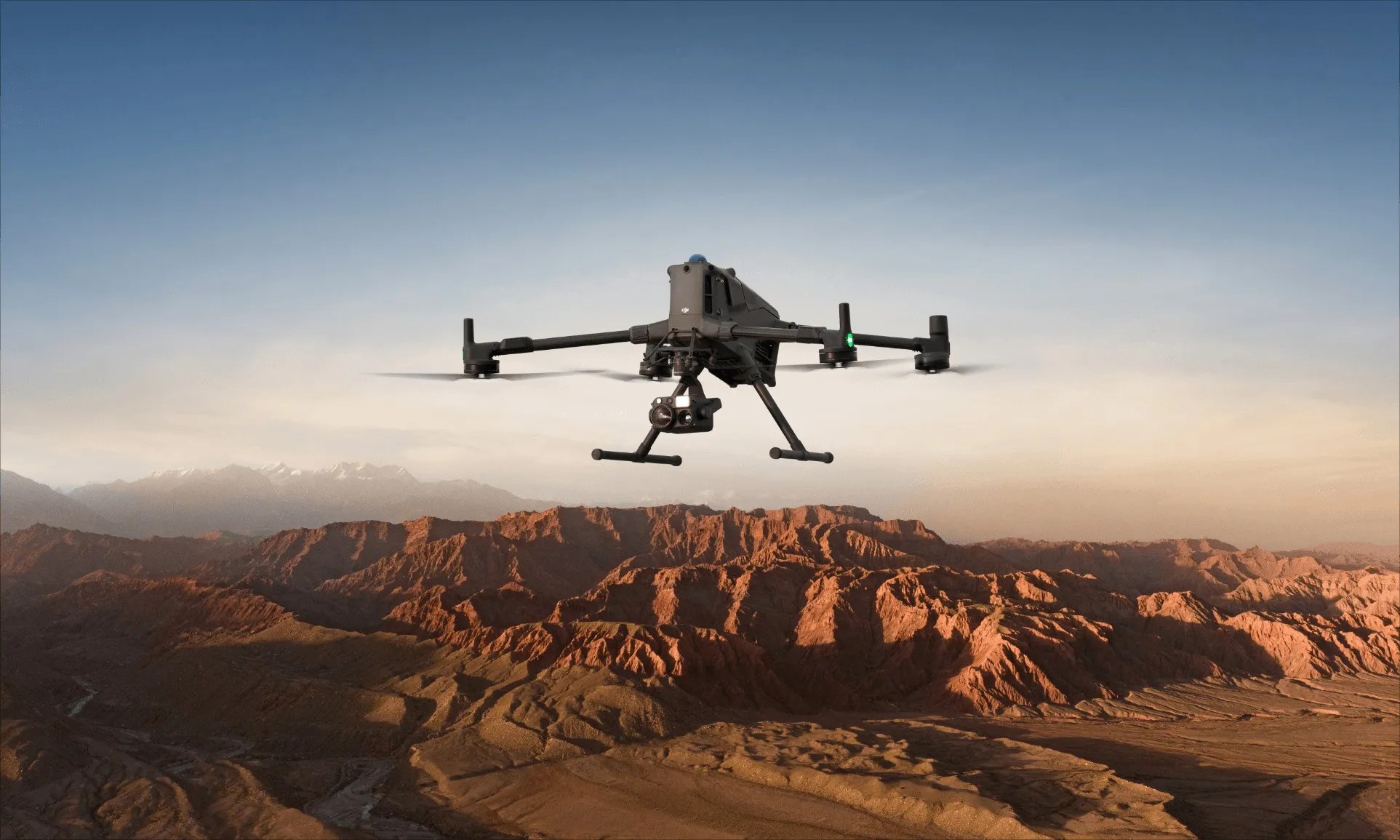 Drone flying beyond visual line of sight over open landscape