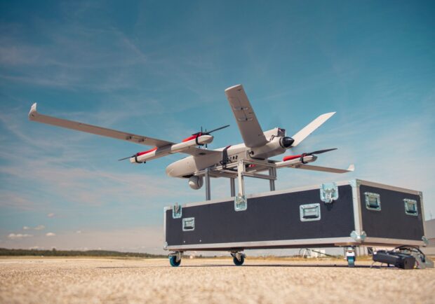 Fixed-wing drone aircraft on a runway