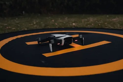 Drone making a precision landing on a landing pad